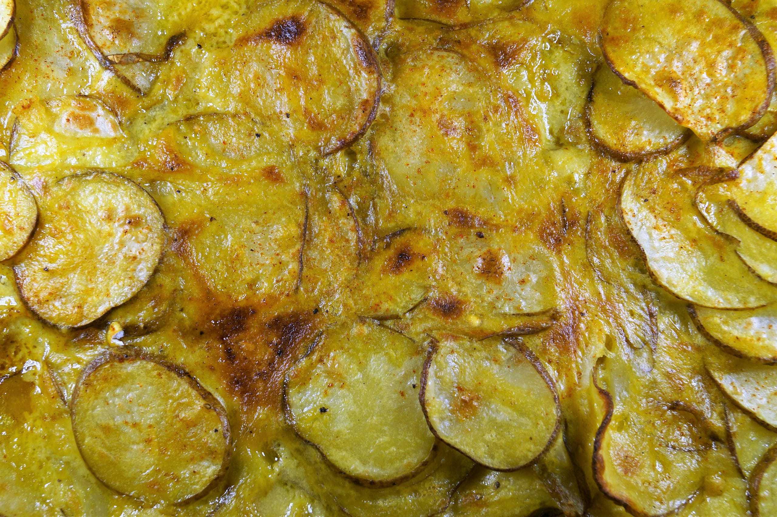 Vegan Cheesy Potatoes Plant‑based sides on a cozy table, featuring salads, veggie dishes, grains, potatoes, pasta, soups, and dips.