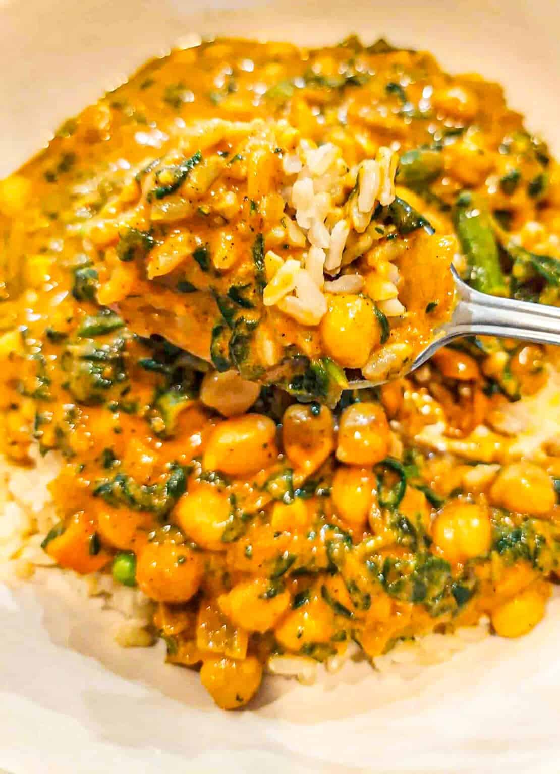 Vegan butter chickpeas in tomato coconut sauce with brown rice