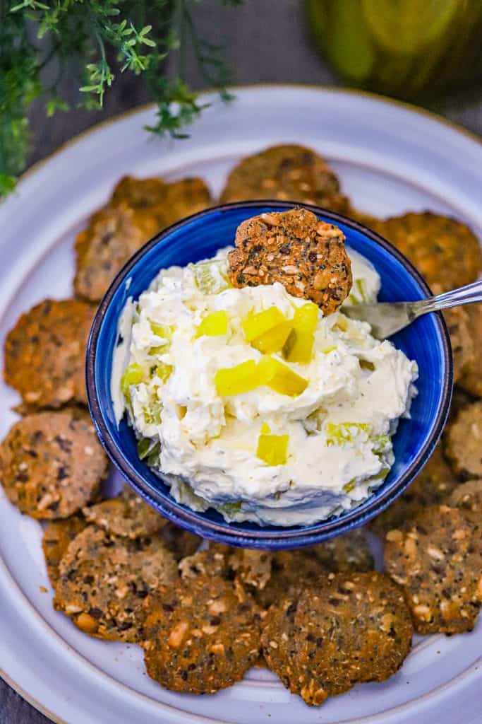 Vegan dill pickle dip with crackers featured in a game day recipe roundup