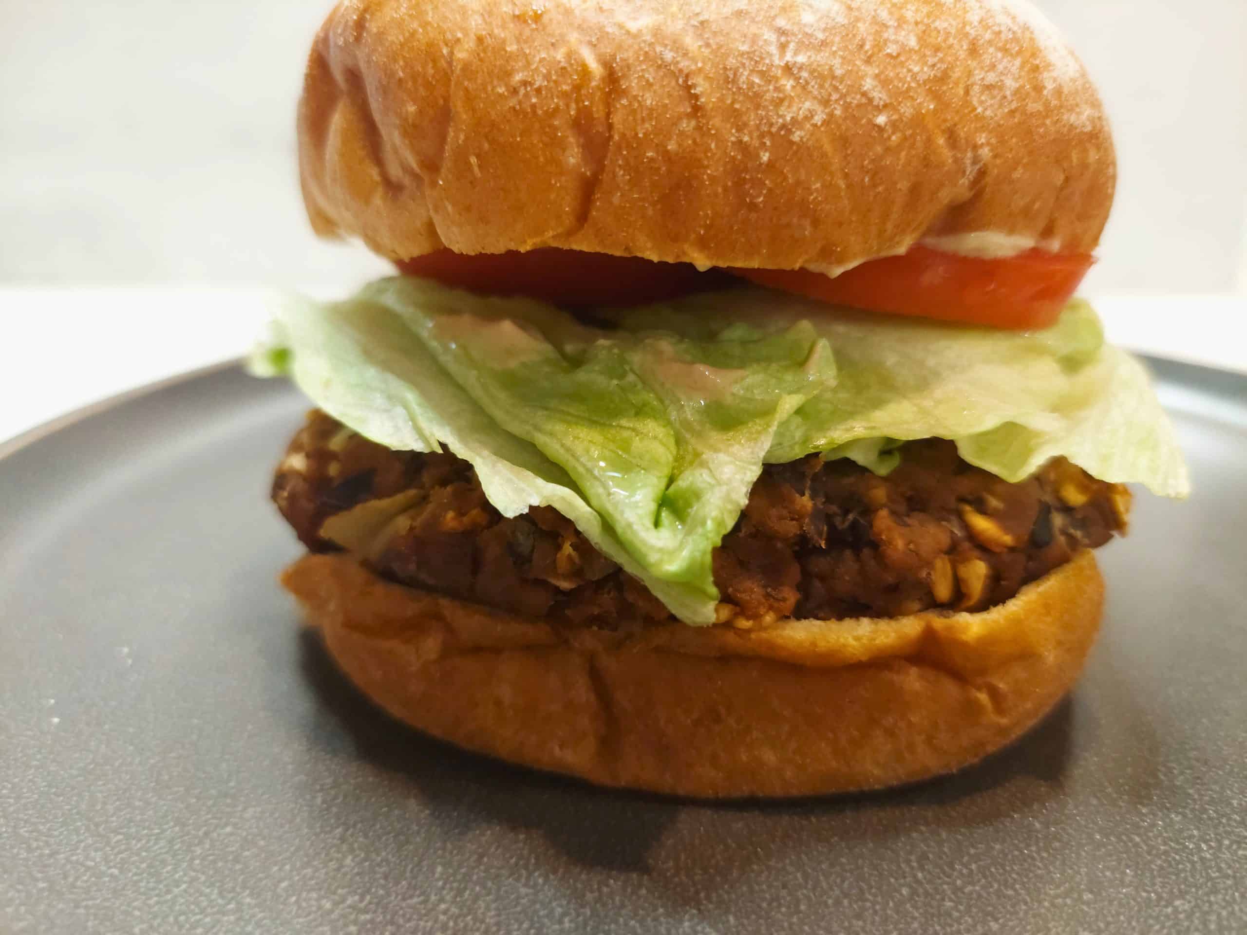 A Homemade Vegan Burger Recipe That Actually Holds Together - Vegan cookout sides with fresh salads, grilled vegetables, and creamy plant‑based dips.
