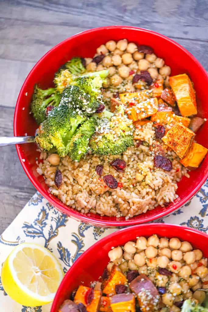 High-protein vegan meal prep lunch with chickpeas, grains, and roasted vegetables