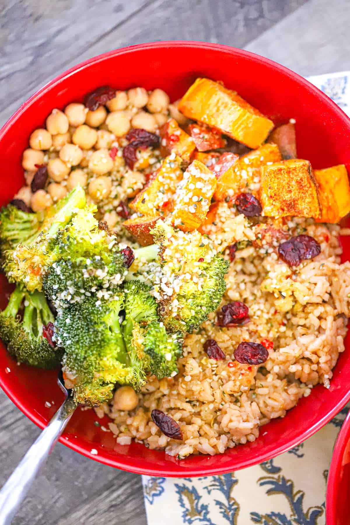 roasted broccoli and sweet potato in a grain bowl