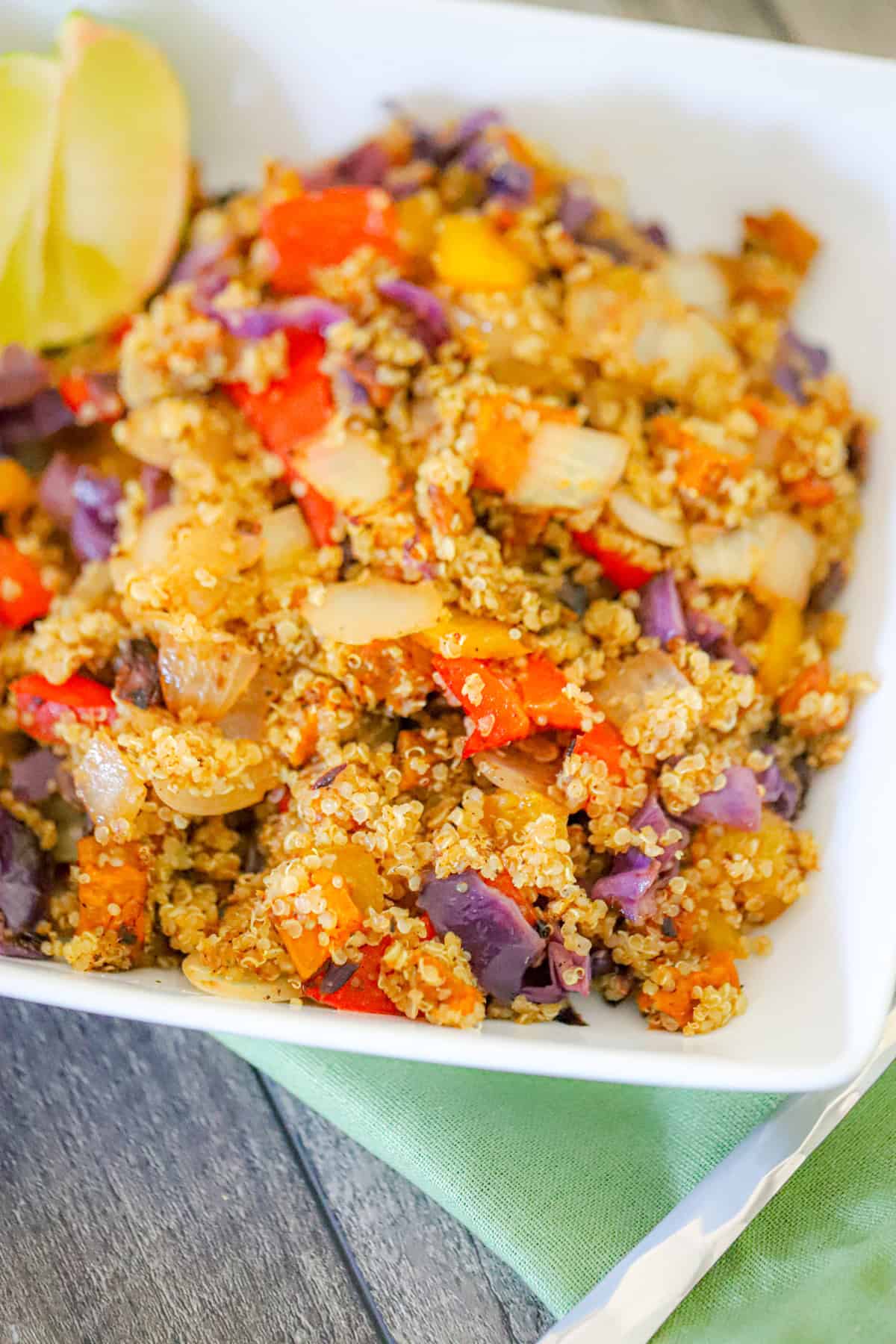 high protein quinoa bowl with roasted peppers lime dressing and hemp hearts